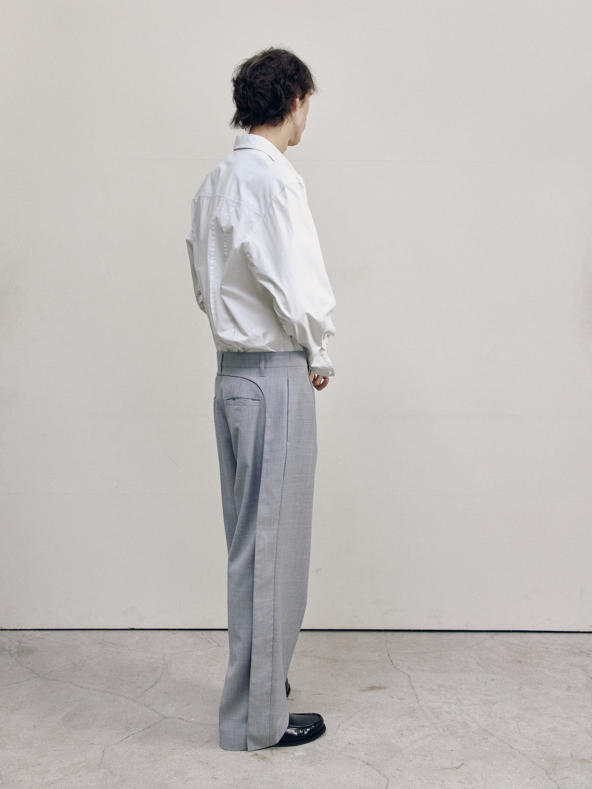 CURVED PANEL PANTS — men 45 degree