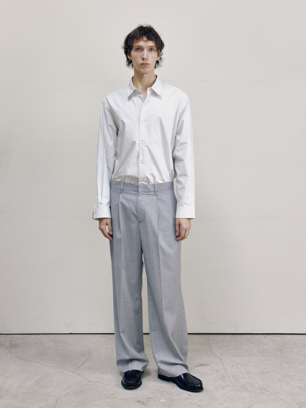 CURVED PANEL PANTS — men front