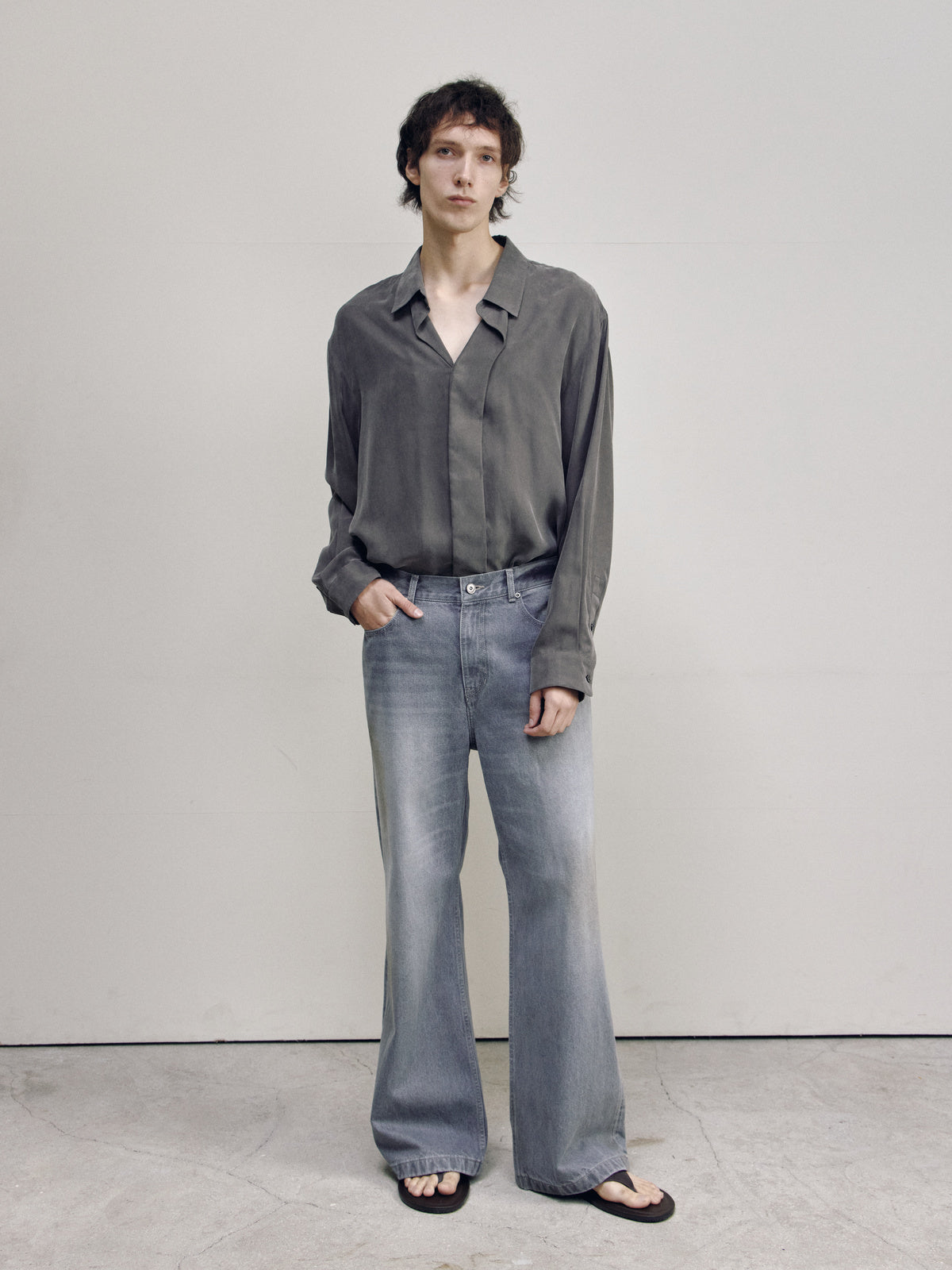 SEMI FLARE DENIM PANTS — DIRTY GREY — MEN FREE POSE